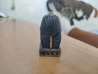Figurine of a pharaoh from Egypt on the shelf