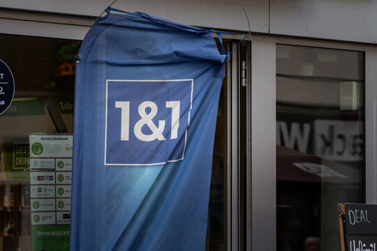 DORTMUND, GERMANY - NOVEMBER 5, 2022: Logo of 1&A in front of a reseller in Dortmund. 1un1 or 1and1 is a german internet service provider and landline and mobile phone carrier.