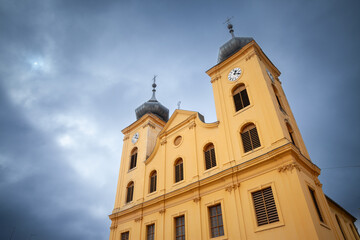 Fototapeta premium Panorama of the church of saint michael of Osijek, croatia, during a cloudy afternoon. Also called Crkva Svetog Mihaela, it's a croatian roman catholic church.