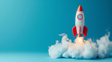 A toy rocket spews smoke on a blue background. The symbol of success is startup education and knowledge.