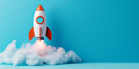 A toy rocket spews smoke on a blue background. The symbol of success is startup education and knowledge.