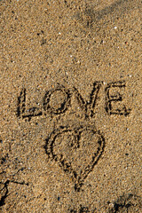 Sandy Love: Heartfelt Embrace on the Beach