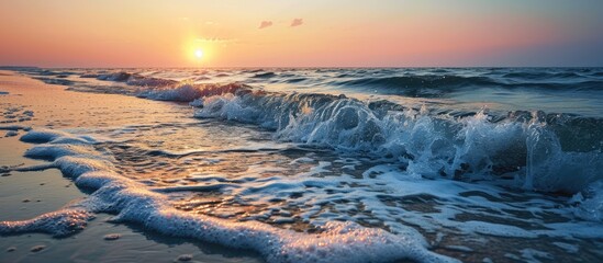 Beach sunset Beautiful panoramic landscape colorful golden sunset over calm sea with waves splashing softly on sandy beach Amazing sunset landscape summer nature peaceful nature. Copy space image - Powered by Adobe