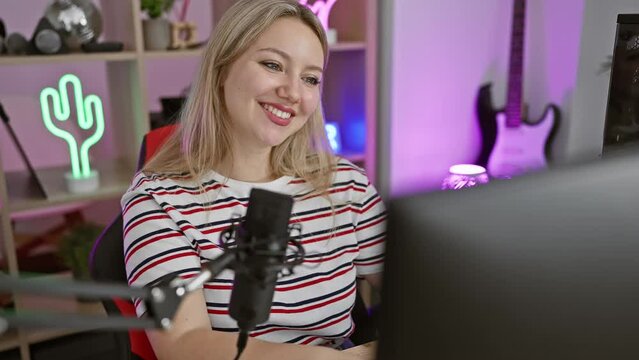 Hilarious portrait of young blonde gaming room streamer making crazy fish face, comical lips at play, funny expression from cute silly grimace - cultivating fun in night indoor session