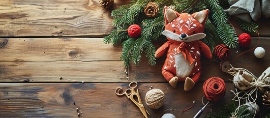 Process of stuffing soft toy red textile fox by handmade top view and sewing accessories. Copy space image. Place for adding text - obrazy, fototapety, plakaty