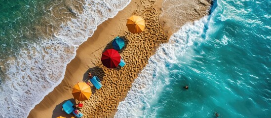 Tropical beach with colorful umbrellas Picture with drone. Copy space image. Place for adding text - obrazy, fototapety, plakaty