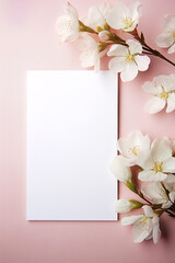Greeting card with cherry blossoms around a blank sheet of paper for placing text, copy space
