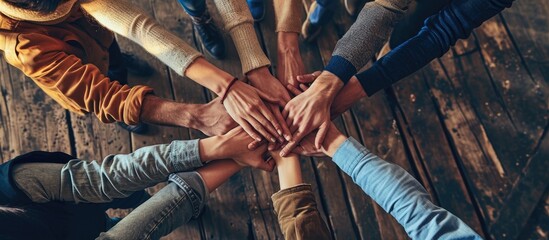 Multiethnic Ethnic Business people Putting Hand Volunteer Friendship Together Friends with stack of hands showing unity and trust worthy Partnership Teamwork team Collaborate working with compe - obrazy, fototapety, plakaty