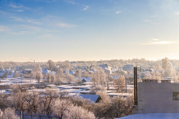 Fototapeta na wymiar Landscape shot of the winter village. Nature