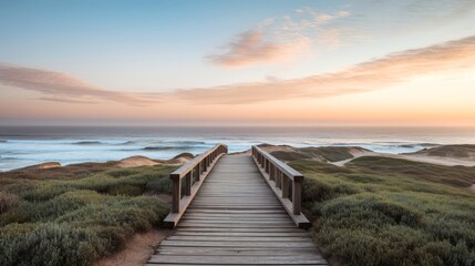 Obraz premium Empty wooden walkway on the ocean coast in the sunset time, pathway to beach