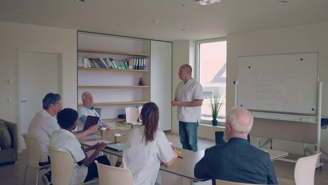 small team medical doctors in meeting for clinical skills refresher