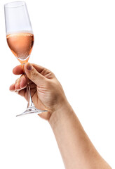 Female hand holds and turning glass of sparkle wine against transparent background. Concept of...