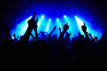 Nightclub, party and audience with hands or lights for music, concert or rave festival with...