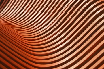 Brown wooden curved slats. Bench element, architectural exterior design of a building. Abstract...