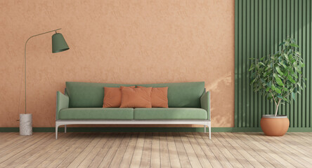 Living room in trend peach fuzz color year 2024 and green sofa