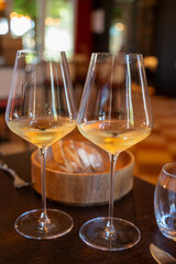 Tasting of Bordeaux white wine in Sauternes, left bank of Gironde Estuary, France. Glasses of white...