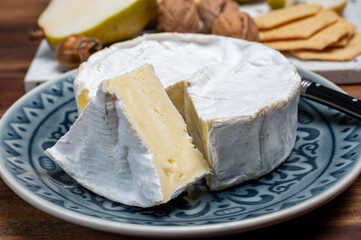 French soft Camembert cheese, original Camembert de Normandie, with white mold