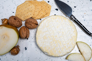 French soft Cremeux de Normandie cheese, soft creamy cheese with white mold