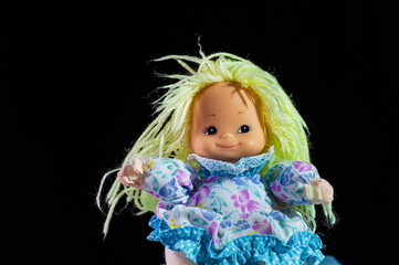 Blonde toy doll.