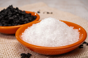 Black and white sea salt close up, Cyprus Black Salt shiny black pyramid-shaped crystals