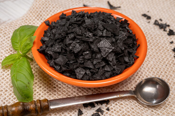 Black sea salt close up, add drama and style to your meals by sprinkling on some Cyprus Black Salt shiny black pyramid-shaped crystal