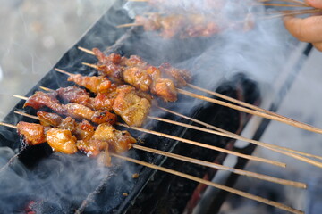 Sate Ambal is a chicken satay typical of the Kebumen area of Central Java. This satay is made from chicken meat seasoned with spices. Sate is cooked by grilling on a charcoal grill. Indonesian food.