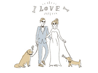 二匹の犬と結婚式を挙げる新郎新婦、