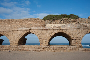 Fototapeta na wymiar The Hadrianic aqueduct of Caesarea Maritima along Israel's Mediterranean coast.
