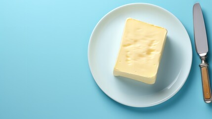 Top view of butter and knife in a clean backdrop with a big copy space, Generative AI.