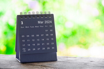 March 2024 table calendar with nature background. Calendar and month concept