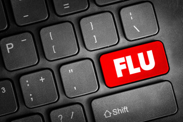 Flu - infectious disease caused by influenza viruses, text button on keyboard, concept background