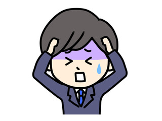 頭を抱えるスーツ姿の男性