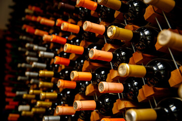Collection of wine bottles - bottle necks with corks close-up.