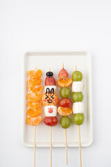 Tanghulu, a fruit skewer Korean snack candy coated with sugar syrup