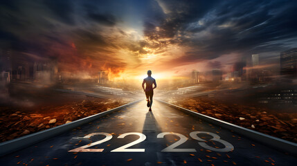 A solitary person strolling during dawn,,
A man walks on a long road with the numbers 2023 on it
 - obrazy, fototapety, plakaty