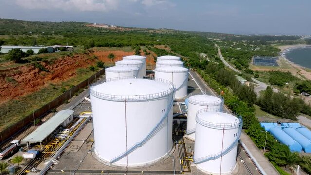 Oil storage tanks and pipes at the oil terminal Phan Ri Vietnam