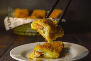 Risoles Mayonnaise or risoles mayo is breaded deep fried pastry make crunchy outside and melted mayonnaise from the inside contain sausage will always be a crowd favourite. selected focus.