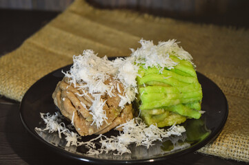 Textured with a focus on Getuk and Getuk Lindri made from processed cassava that is steamed and mashed. Served with grated coconut.