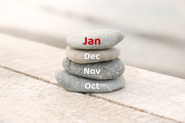 January writing on the stones. First month of the year. A new year and new plans concept
