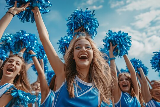 Group Of Enthusiastic Cheerleaders, Empowering The Team With Their Energy And Spirit