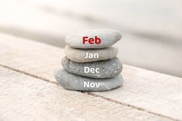 February writing on the stones. Second month of the year. Winter concept