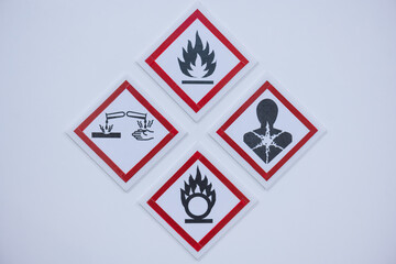 Symbols warning of chemical hazards are posted in laboratories in hospitals.