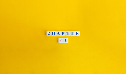 Chapter 1. Book Division, Section, Part, Specified Unit, Portion. Text on Block Letter Tiles on Yellow Background. Minimalist Aesthetic. - obrazy, fototapety, plakaty