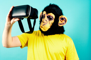 Man in Monkey Mask Holding VR Headset