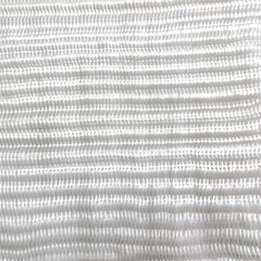 Diagonal white cable knit texture with shadow and light interplay on soft fabric