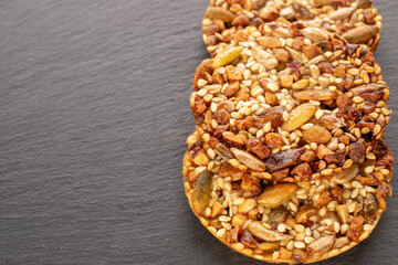 Three Thaler cookies on a slate stone, macro.