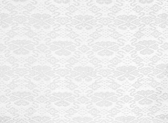 Vintage flowers of Thai style fabric pattern.Monochrome black and white tone.Abstract horizontal seamless fabric background and texture.Beautiful patterns, space for work, vintage wallpaper, close up.