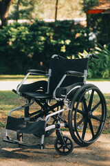 Fototapeta premium Single wheelchair parked in hospital hallway