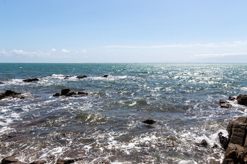 waves breaking on the rocks
