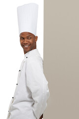 Smile, man and chef on billboard menu in studio isolated on a white background mockup space. Happy, cooking and African person on poster for advertising, marketing and restaurant promotion banner